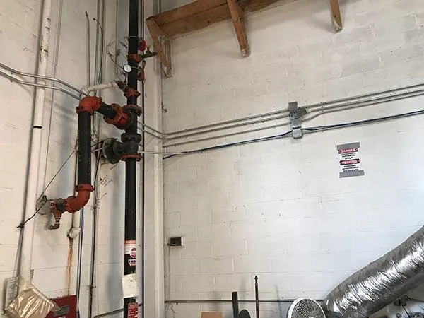 Conduit and fire-protection riser wiring by Elite Electric
